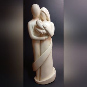Mom, Dad and Child Figurine